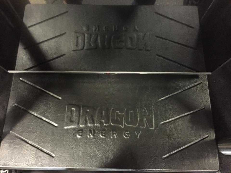 Geometric embossed car audio panel