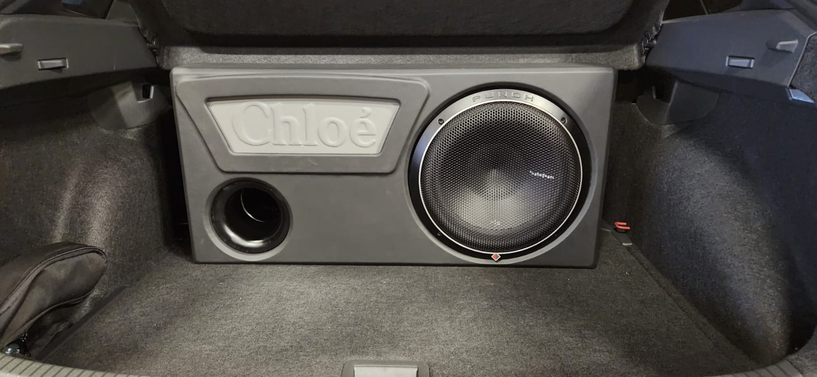 Gray door panel speaker installation